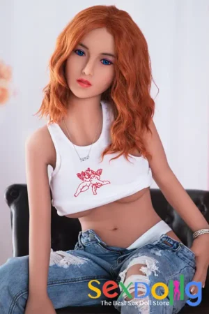 145cm-Wheat-Skin-Petite-Sex-Doll Scarlett sitting on sofa